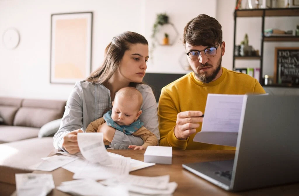 Happy family planning their financial future together